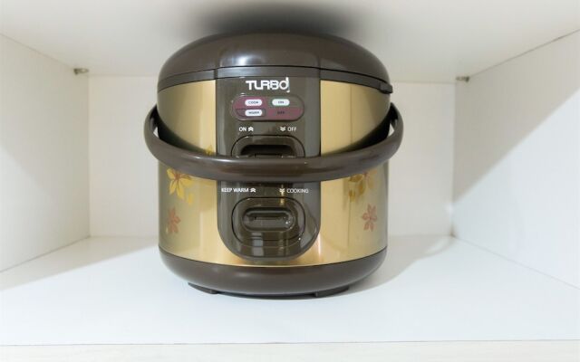 Studio Room Azalea Suites Apartment