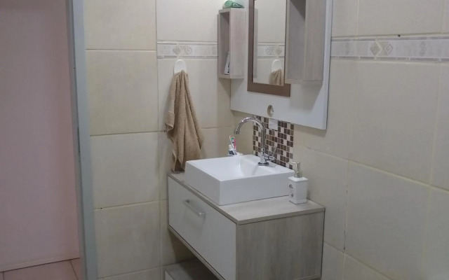 Quarto aconchegante em Apê, no Calçadão