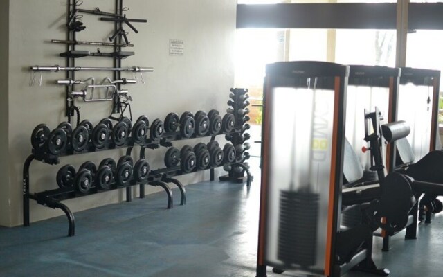 150m da praia com piscina aquecida e sauna