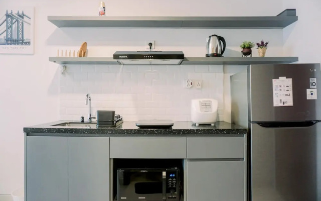 Homey And Warm Studio At West Vista Apartment