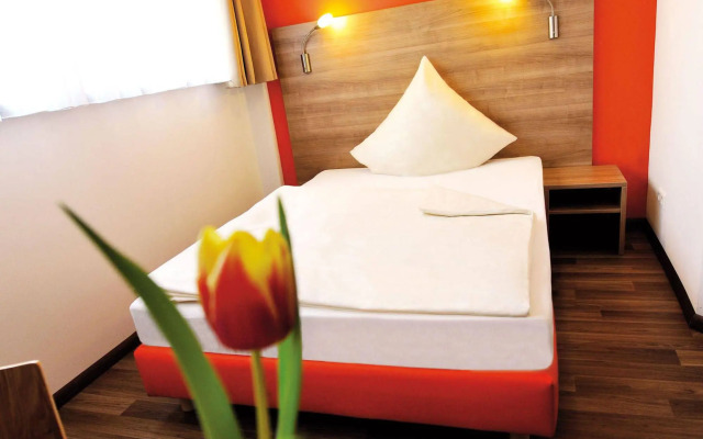 Orange Hotel und Apartments