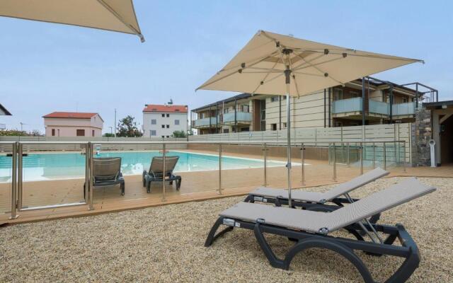 Leonardo - swimming pool and wide patio with barbecue