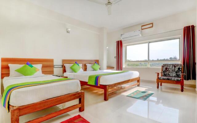Treebo Atithi Comforts, 1 Km From Nisargadhama Forest
