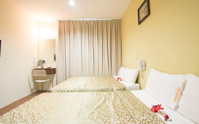 Grand Inn – Guest Rooms – George Town