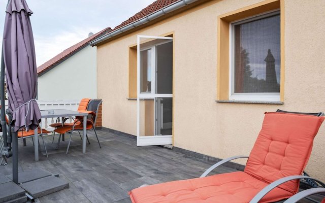 Snug Apartment in Kalkhorst with Terrace near City Center