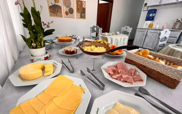 Dago Suítes Pousadinha