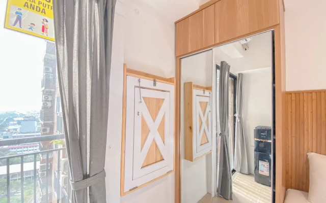 Homey & Restful Studio At Tamansari Panoramic Apartment