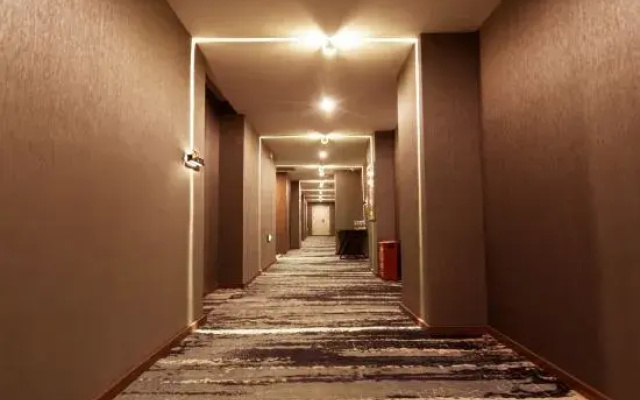 Korla Jianuo Imprint Hotel (Huijia Times Square) - фото 2