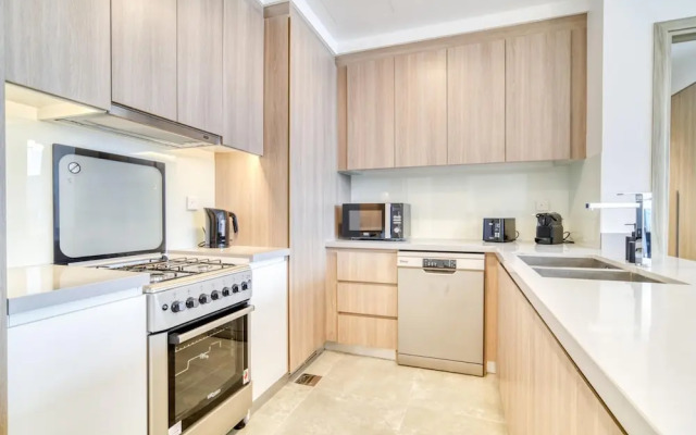 Elegant 2BR w Breathtaking Marina Balcony