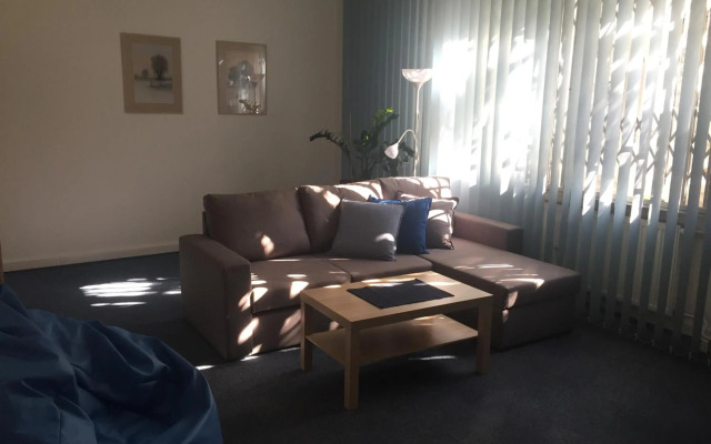 Blue apartment in beautiful English style garden with atmosphere