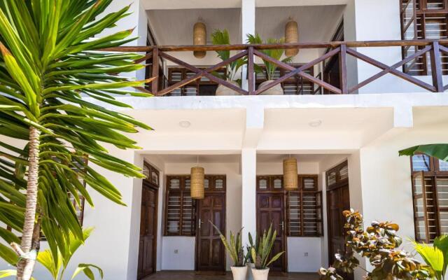 KIMA Serviced Beach House & Suites