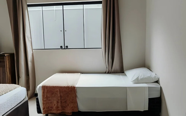 Casa Central piscina e AC para 8 hospede