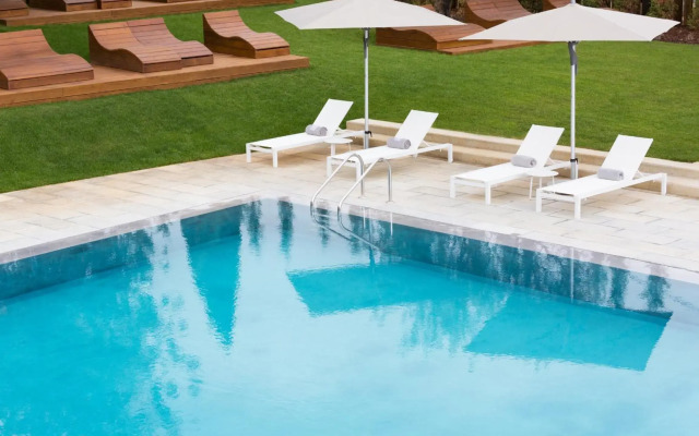 Ozadi Tavira Hotel