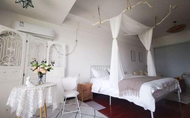 Quzhu City Homestay (Shiyan Wanda Plaza Branch)
