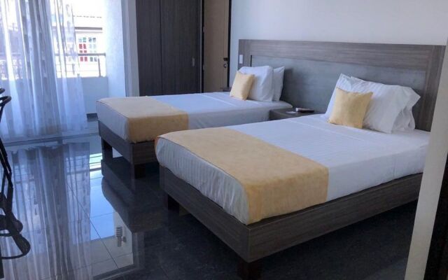 B&E Aparta-Suites Hotel