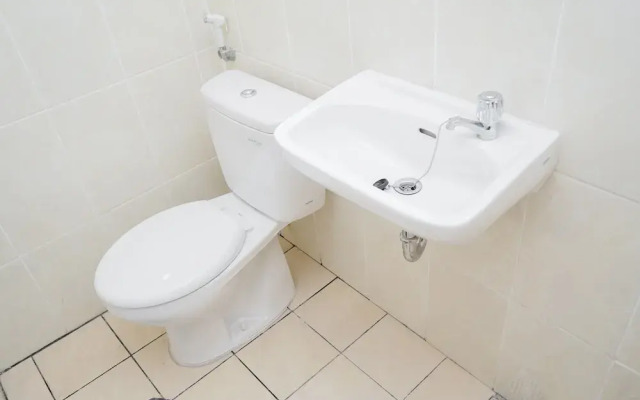 Comfort with Garden View Studio Apartment M-Town Residence