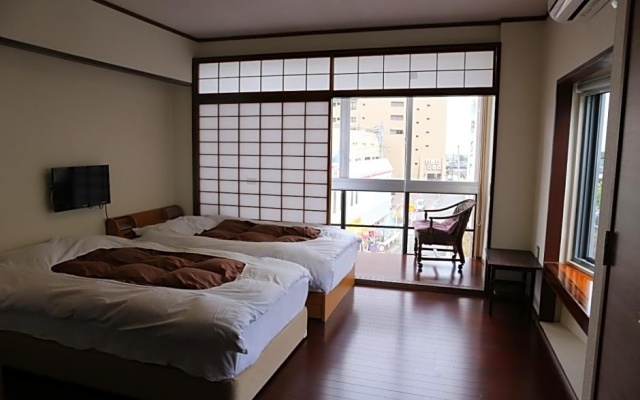 Izu 4 sea ocean reinforced con Double bed + single bed 2 sea view (room – Guest Rooms – Atami