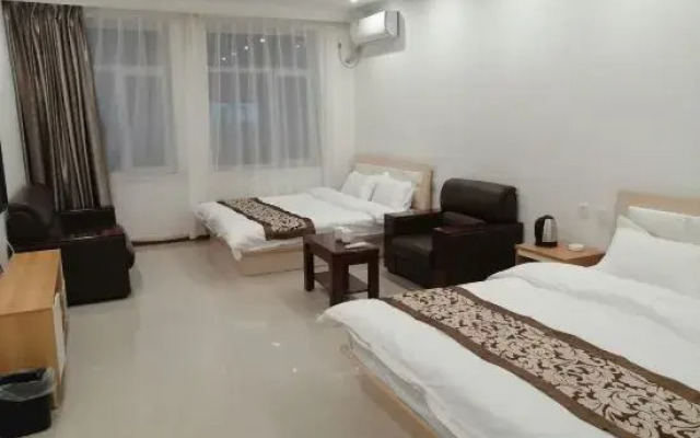 Kangping Hexing Hostel