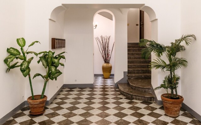 Terrazza e stile sui tetti della Kalsa