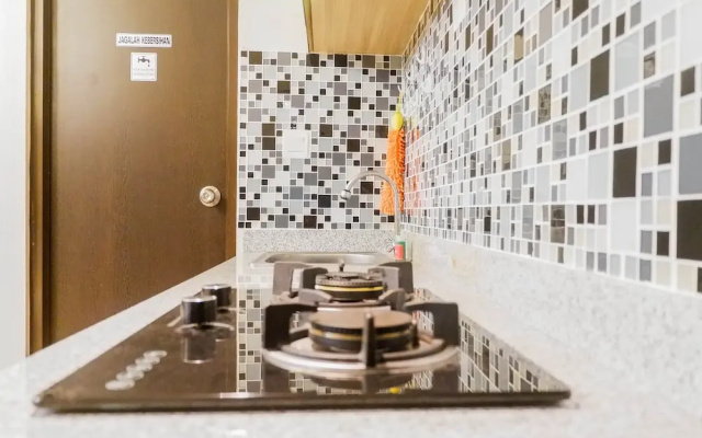 Homey 2BR Apartment at Tamansari Papilio