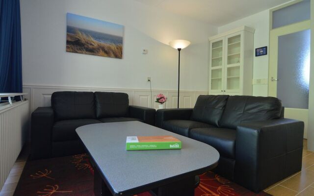 Apartment in Nieuwvliet with Roof Terrace, Garden, Parking