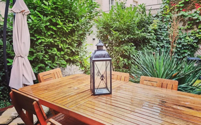 Maison de ville avec terrasse et jardin