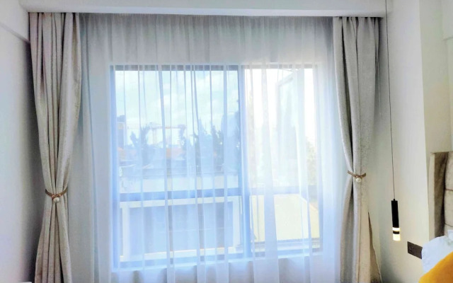 Luxurious Nairobi Condo With Rooftop Pool & Gym