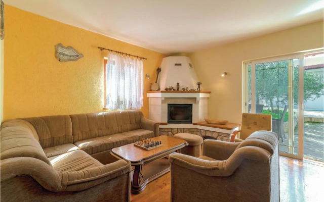 Two-Bedroom Holiday home Jezera with a Fireplace 05