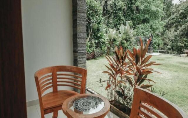 Sekar Arum Riverside Resort in Canggu by ZUZU