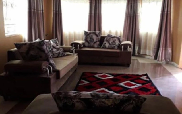 A & J Holiday Suites