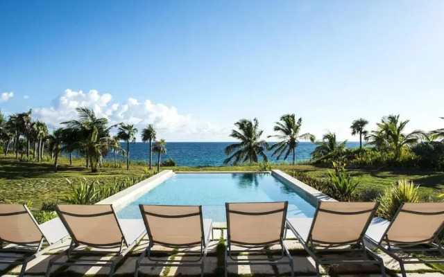 Dream Villa: Private Oasis Above Pink Sand Beach
