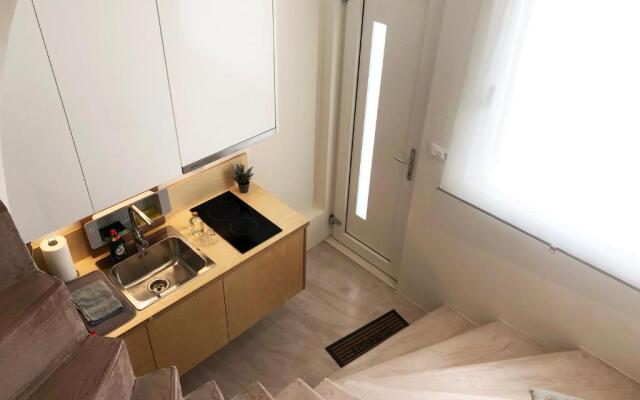 Sunny micro-loft apartment with outdoor lounge