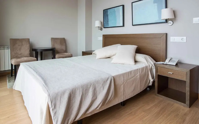 Apartamentos Turísticos Playa de Osmo