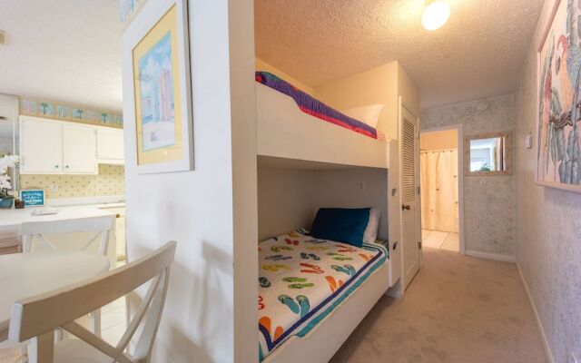 Sun Kissed Beachside Condo With Pool