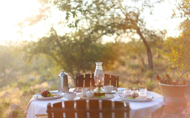 Ivory Wilderness River Rock Lodge