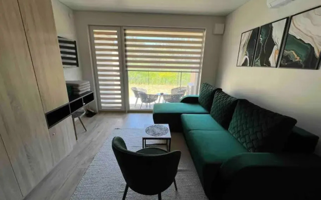 Modern & cozy studio with patio “Prie Juros”