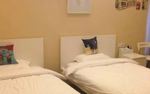 Yueming Holiday Apartment Hotel