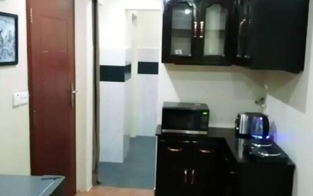 Mikocheni Studio APartment with a car