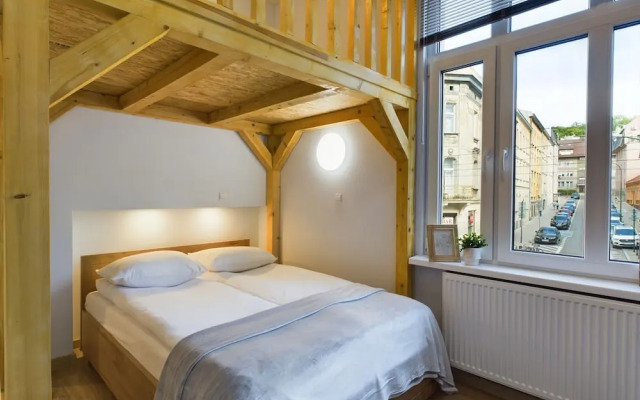 Wooden Cracow Apartment by Renters