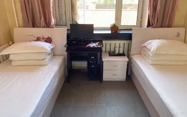 Tahe Jinshengyuan Fashion Hotel