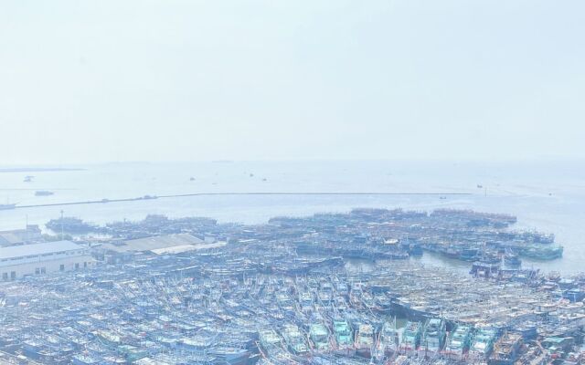 Minimalist And Homey Studio Green Bay Pluit Apartment