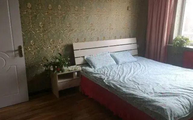 Tiantiansheng Warm Theme Apartment