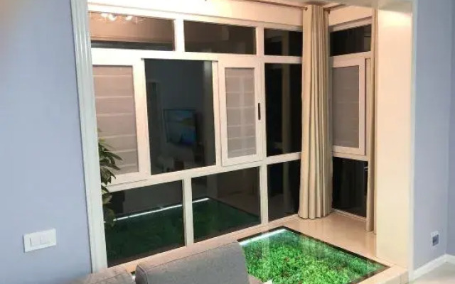 Danjiangkou Threeofus Apartment