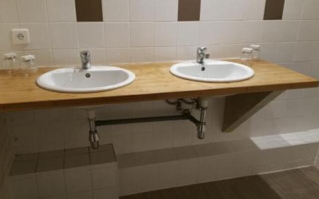 Chambres touristiques La Cour Des Hôtes