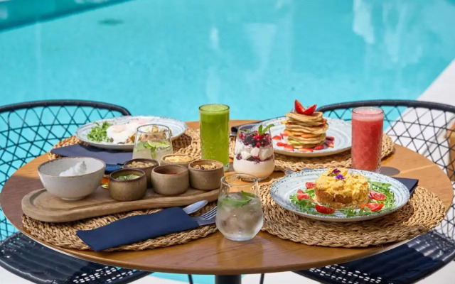 Adorno Beach Hotel & Suites