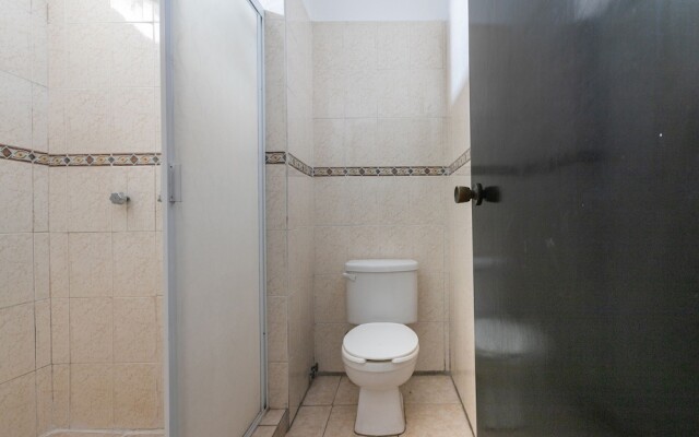 Capital O Zona Dorada Inn