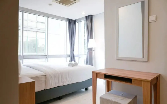 Comfortable Deluxe 2BR at The Empyreal Condominium Epicentrum Apartment By Travelio