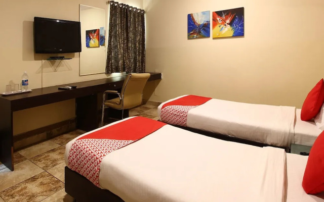 Capital O 18592 M Hotel