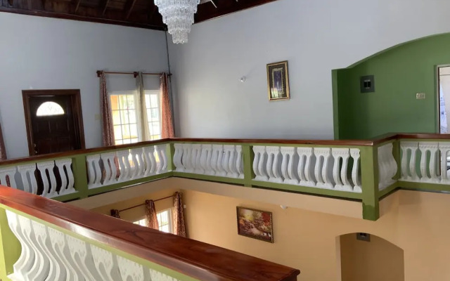 Poinciana House