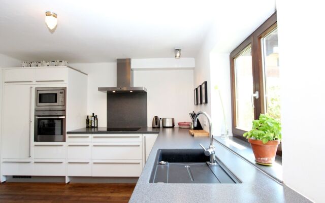 Quaint Chalet in Kirchberg with Terrace, Garden, Ski Storage